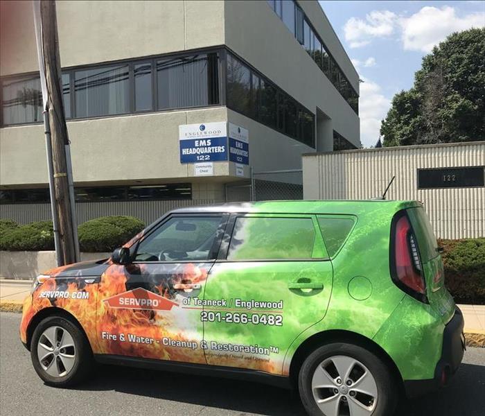 SERVPRO vehicle outside job site.