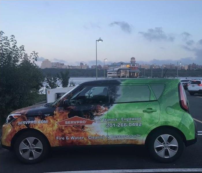 SERVPRO vehicle outside job site.