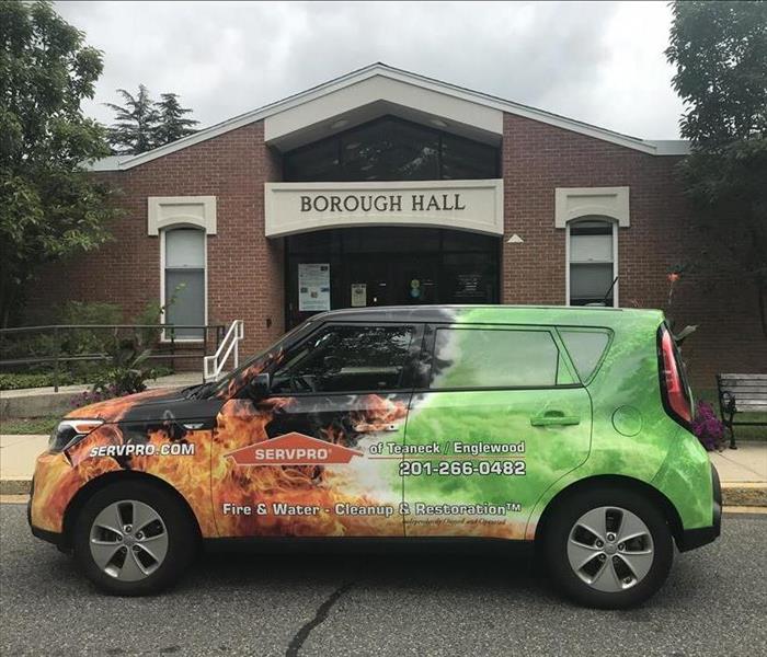 Small SERVPRO Wrapped Vehicle Parked by the Borough Hall